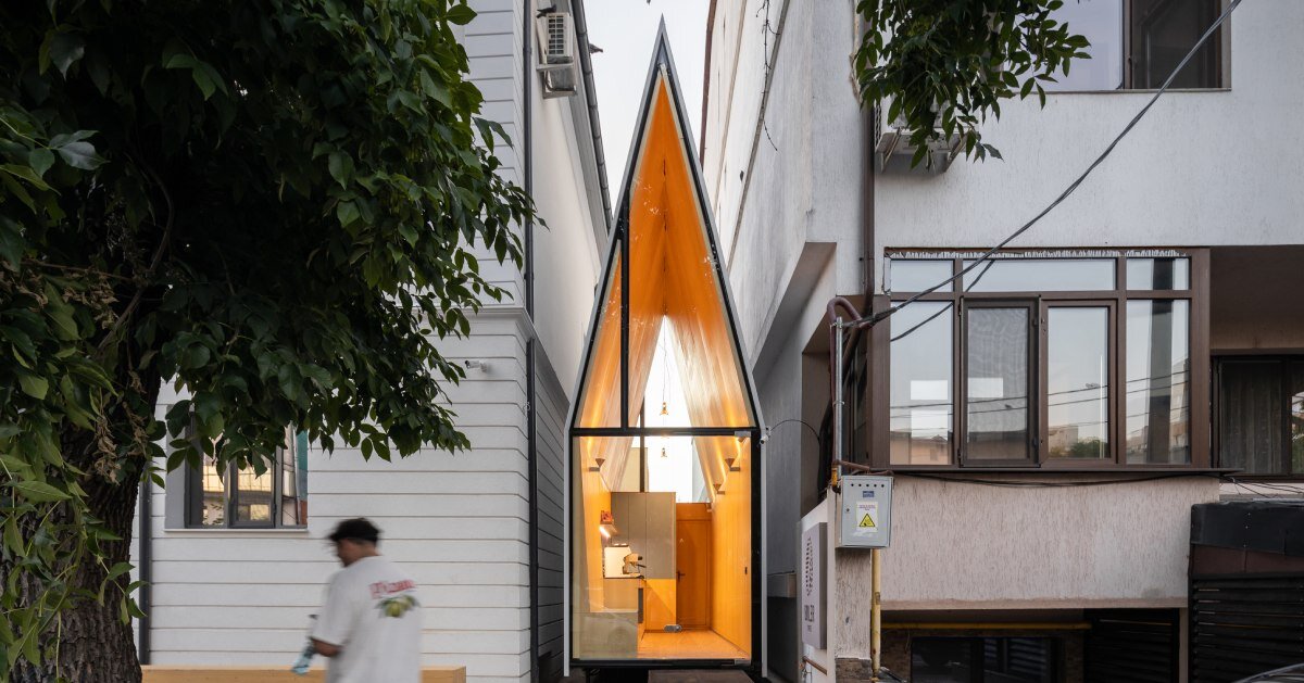 vinklu inserts prism into urban gap for coffee shop in romania