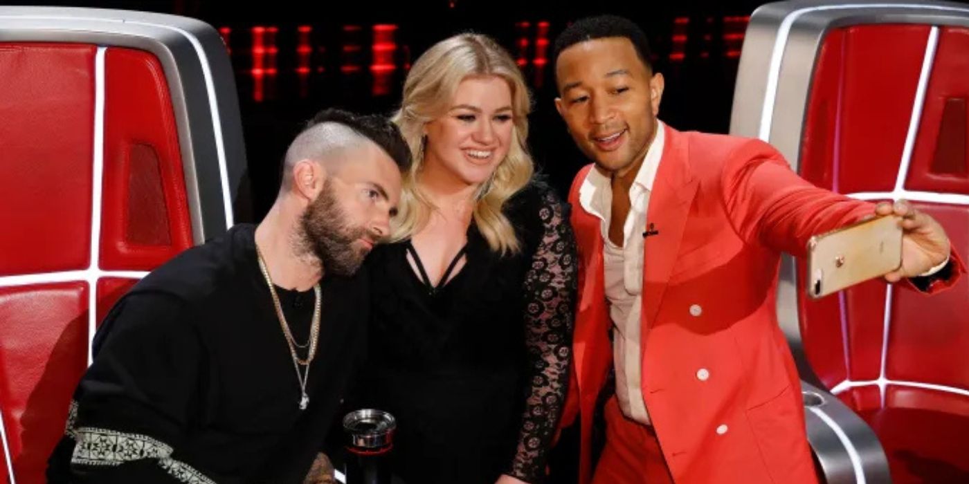 Adam Levine, Kelly Clarkson, and John Legend snap a selfie on the set of 'The Voice.'