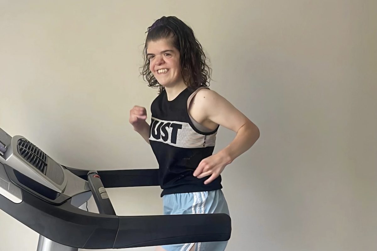 Runner with rare genetic condition conquers treadmill marathon