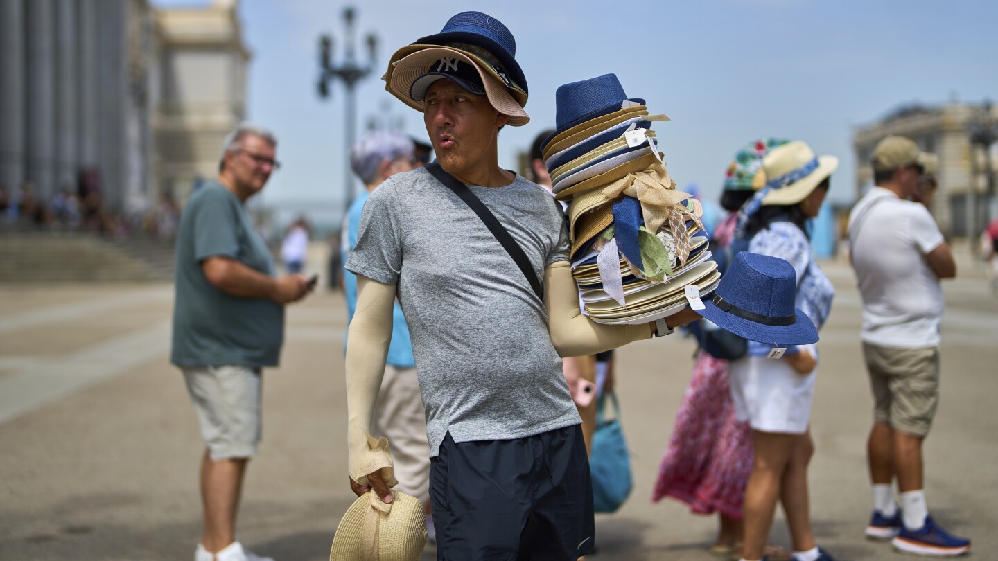 Europe sizzles and the Eiffel Tower's summit closes