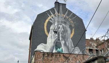 A new mural in France shows the Statue of Liberty covering her eyes in a swipe at Trump
