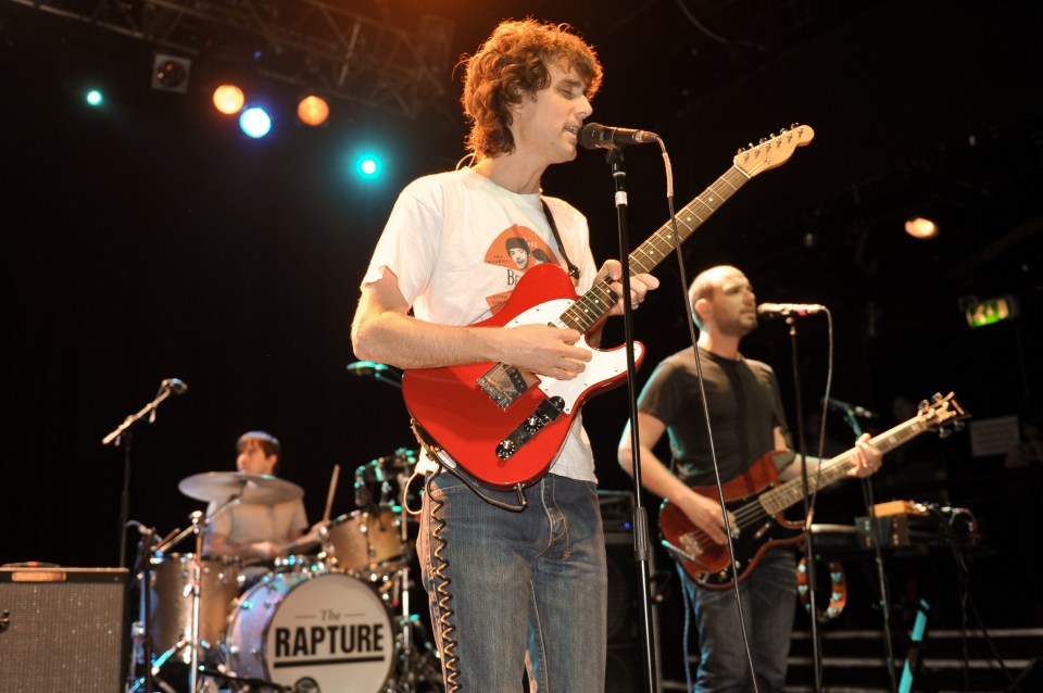 The Rapture performing live on stage.