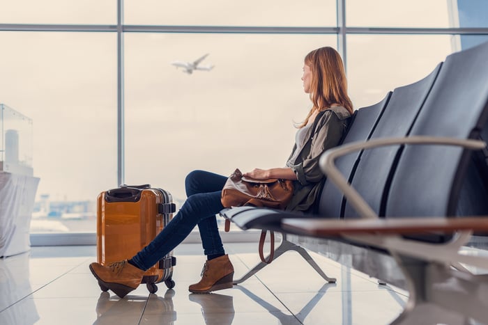 A passenger at an airport.