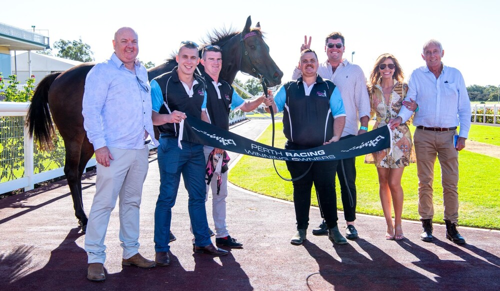 Wild Belle with trainer Luke Fernie and connections
