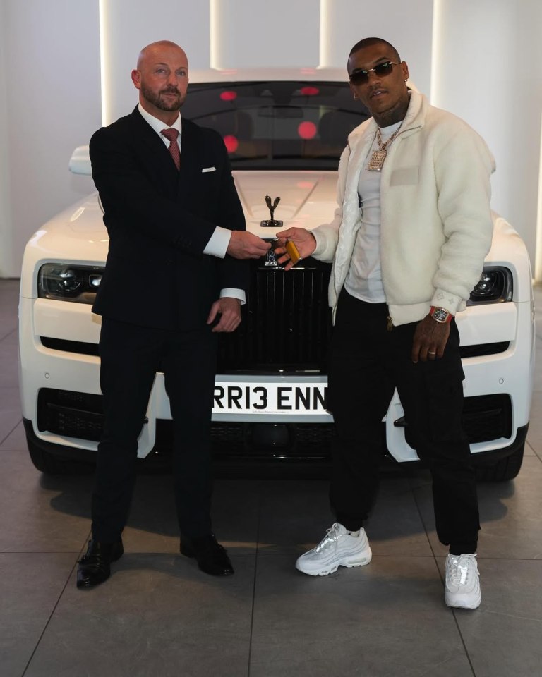 Conor Benn receiving car keys.