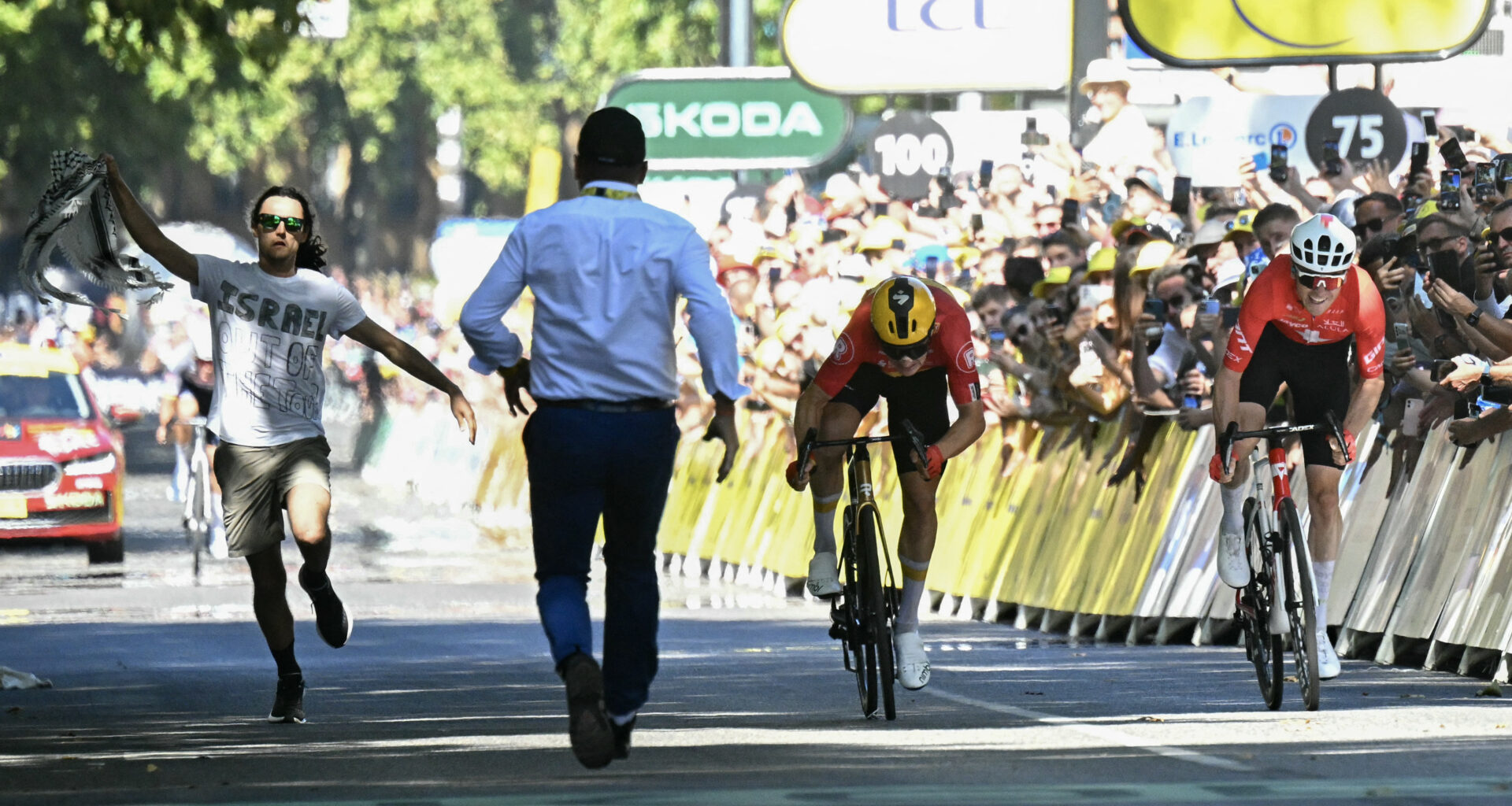 Anti-Israel protestor on finish at Tour de France