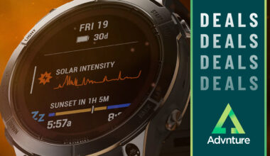 Close-up of Garmin Fenix 7 Pro Solar watch face with 'deals' label and Advnture website logo