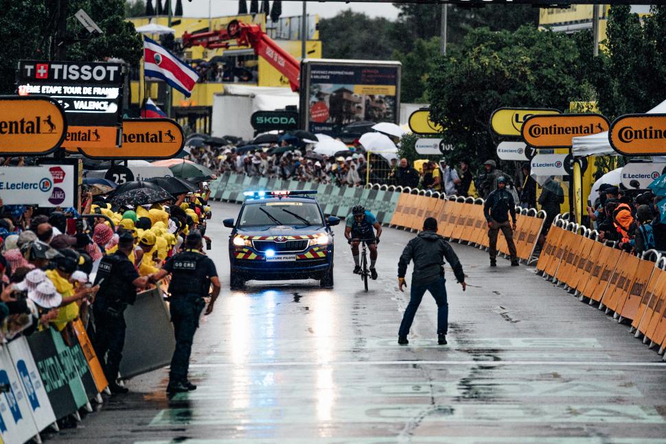 Course invader tackled by police at the finish line of stage 17, 2025 Tour de France, in Valence 