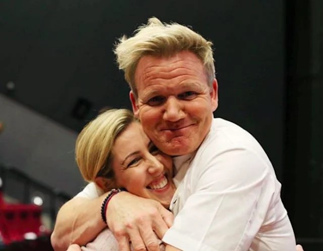 Gordon Ramsay and Clare Smyth embracing.