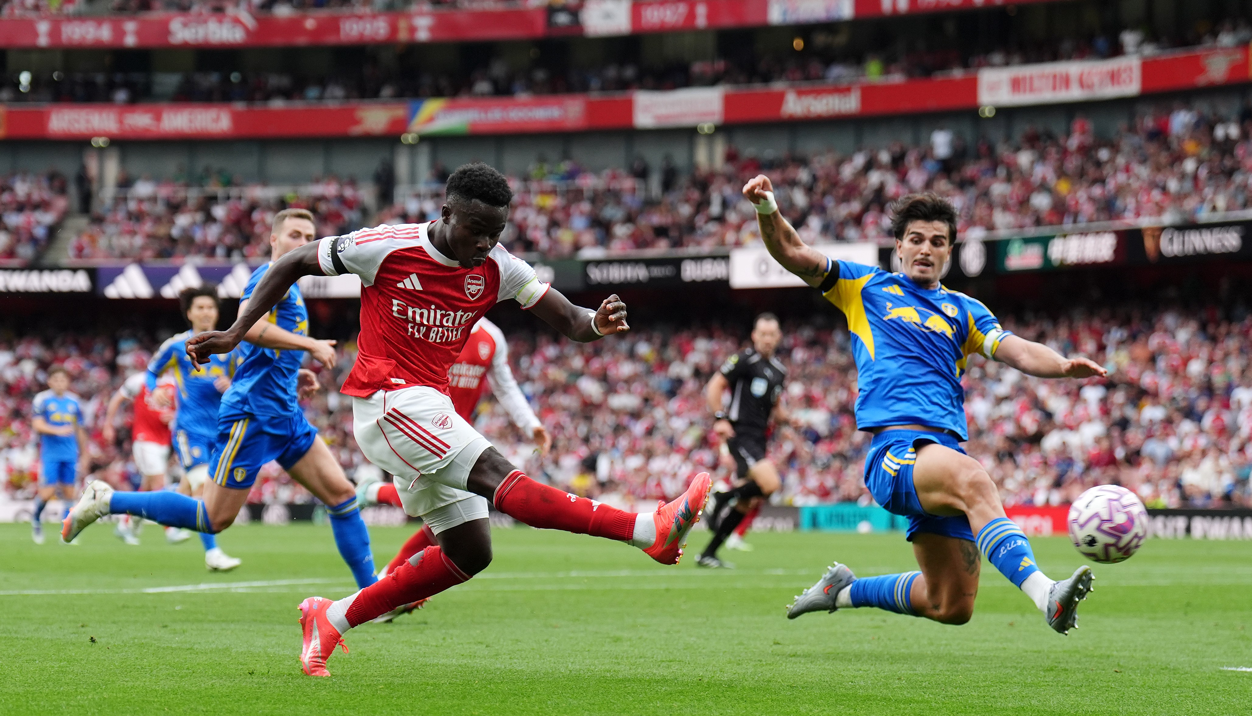 Bukayo Saka scoring a goal for Arsenal.