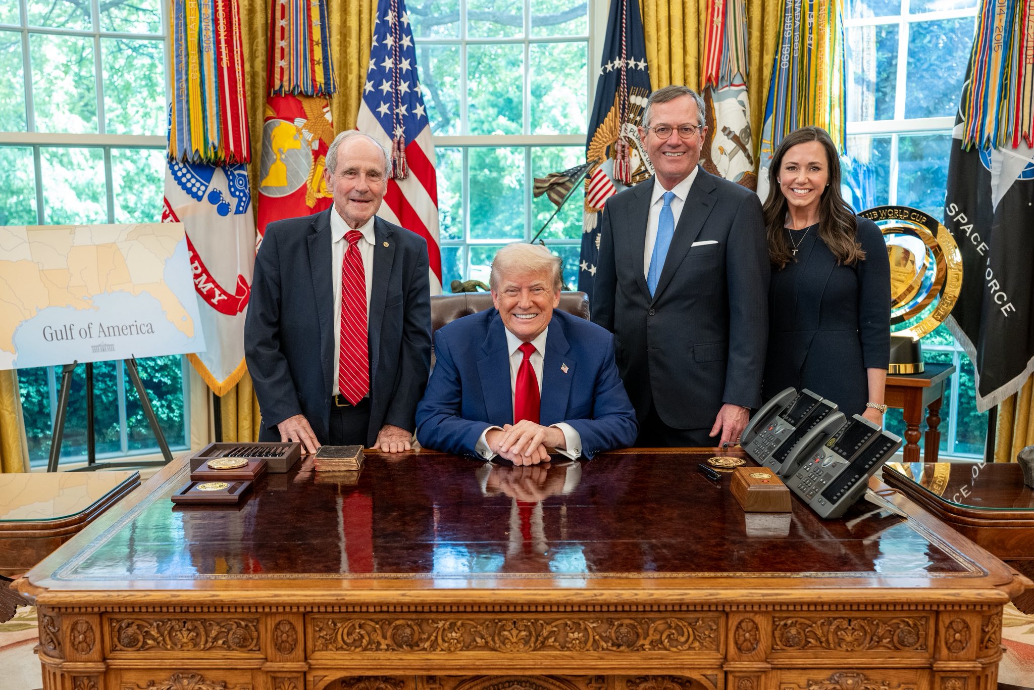 President Trump with Warren Stephens and Katie Britt Boyd in the Oval Office.