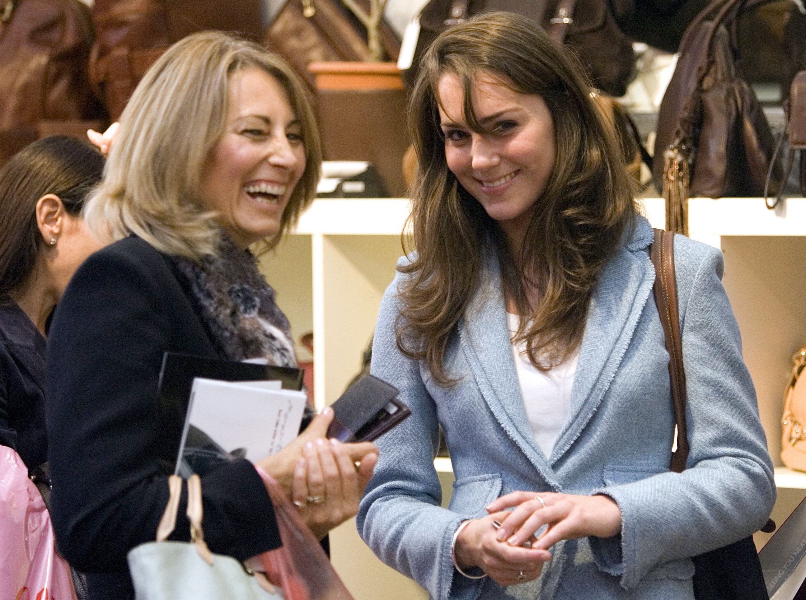 Kate Middleton and her mother at a Christmas shopping festival.