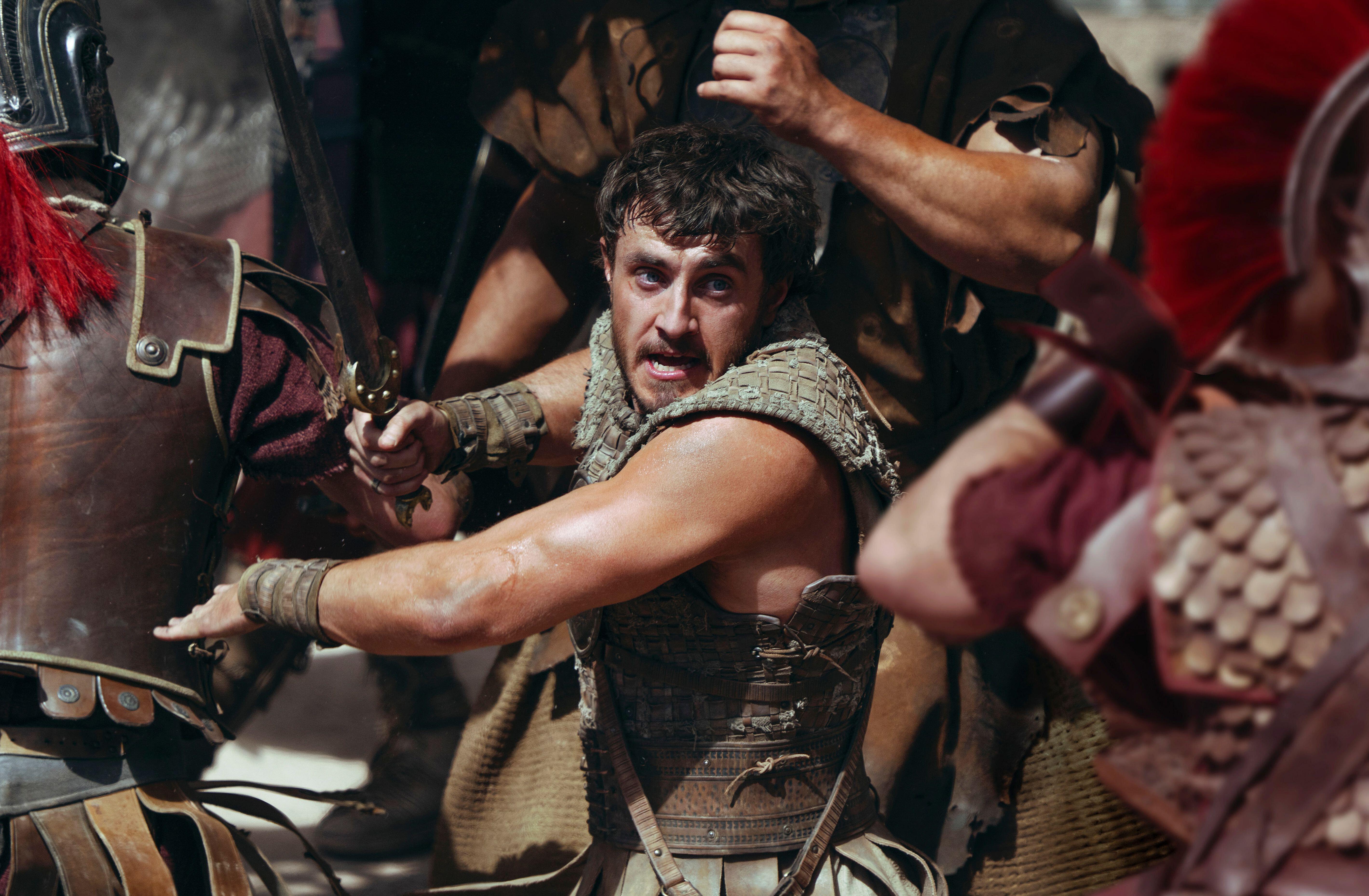 Paul Mescal as Lucius in Gladiator II, fighting in the Colosseum.