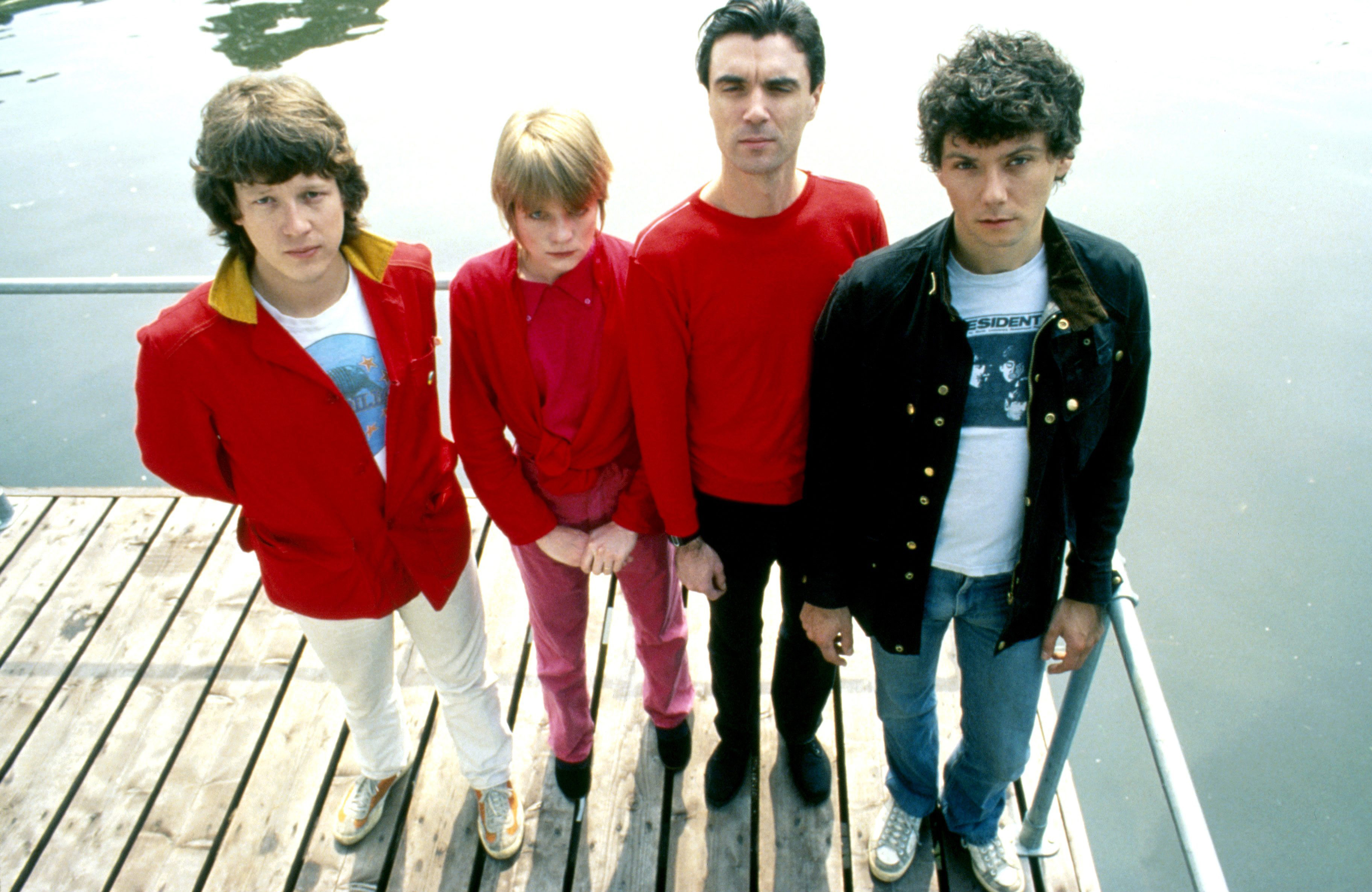 Photo of the Talking Heads band members posed together.
