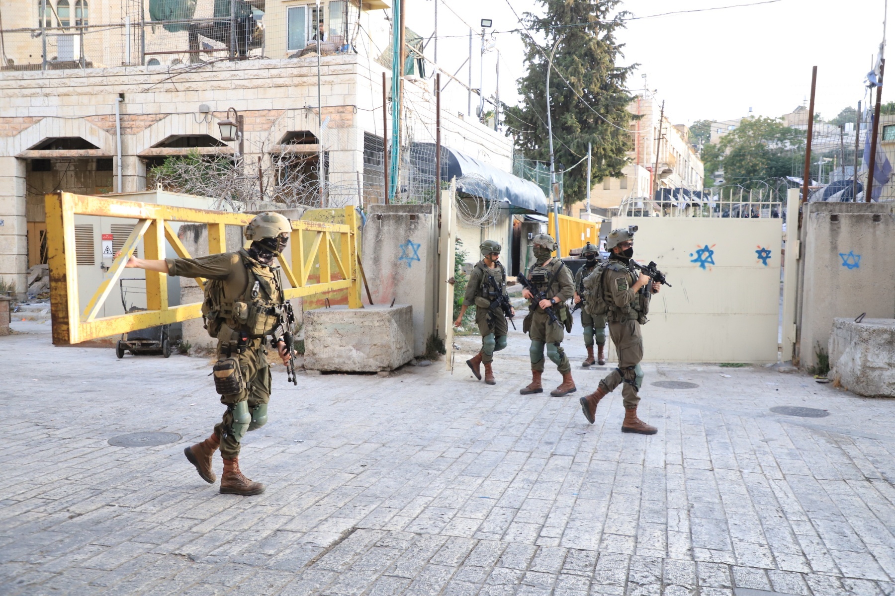 Israeli soldiers in Hebron during a raid by Jewish settlers.