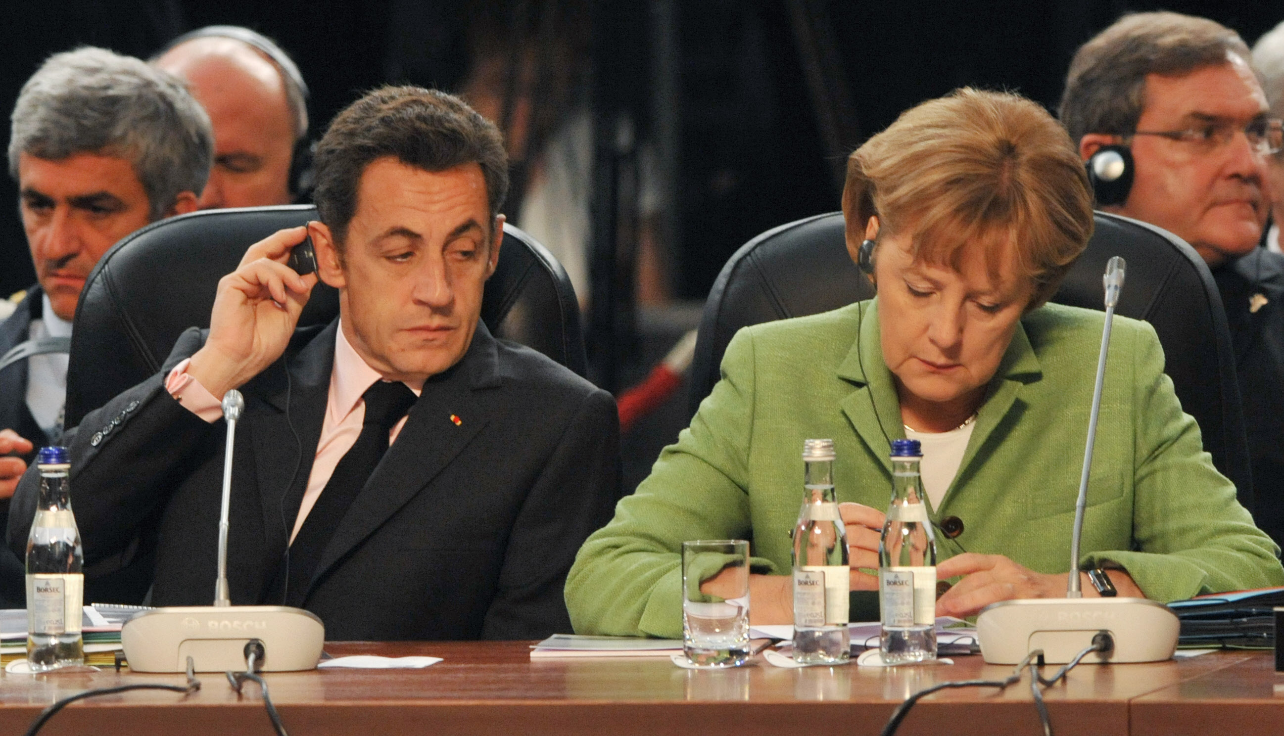 Nicolas Sarkozy and Angela Merkel at a NATO summit.