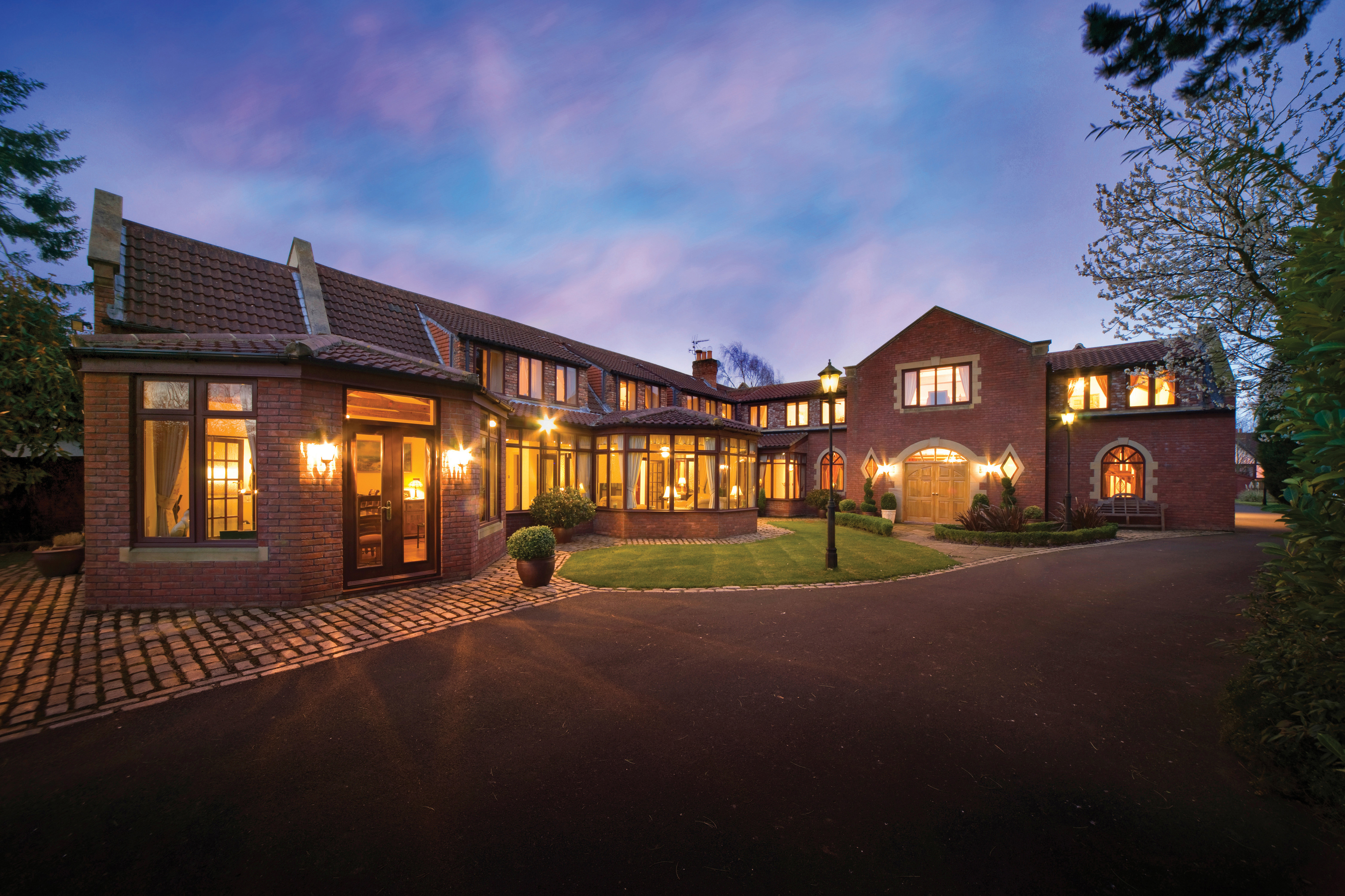 Brick house at dusk.
