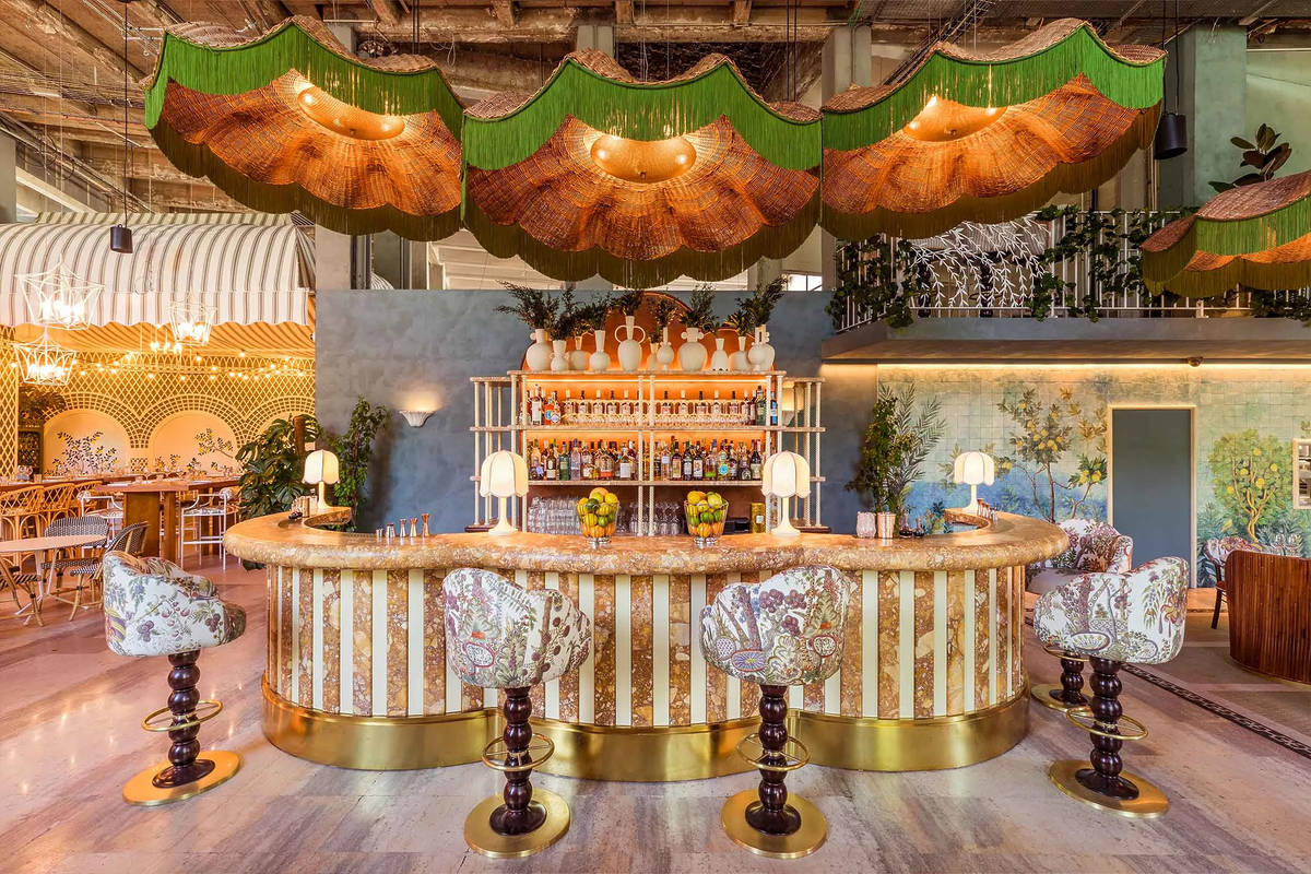 a gorgeous and ornate, but still casual, italian restaurant where each wall and counter and surface draws from a different world of Italian aesthetic and design