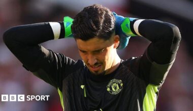 Man Utd goalkeeper Altay Bayindir with his hands on his head