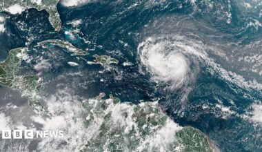 A satellite image shows Hurricane Erin advancing in the Atlantic Ocean
