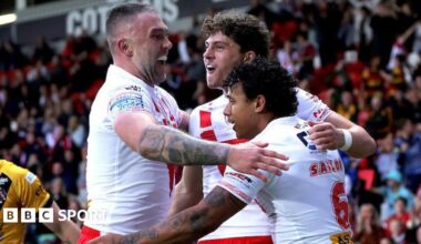 St Helens player Owen Dagnall is congratulated by teammates after scoring a try against Castleford Tigers.