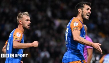 John Marquis (right) celebrates scoring for Shrewsbury