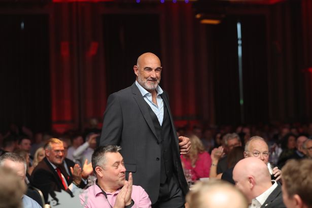 Chris 'one man riot' Wyatt, who flew over from the south of France, makes his way to the stage