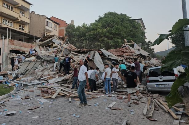 Two people were reportedly trapped in a building collapse