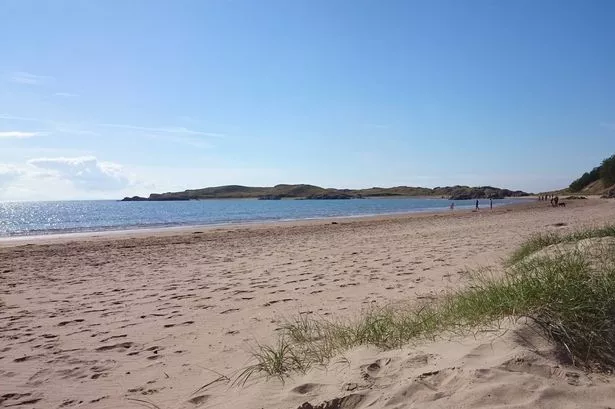 Llanddwyn's car parks were closed for much of Bank Holiday Monday - though some visitors still trekked through the forest to reach the beach