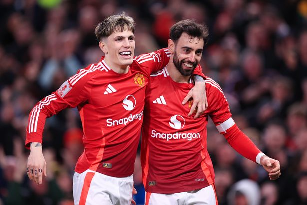 Bruno Fernandes of Manchester United (R) celebrates with Alejandro Garnacho of Manchester United after scoring their 1st goal during the Emirates FA Cup Fifth Round match between Manchester United and Fulham at Old Trafford on March 2, 2025 in Manchester, England