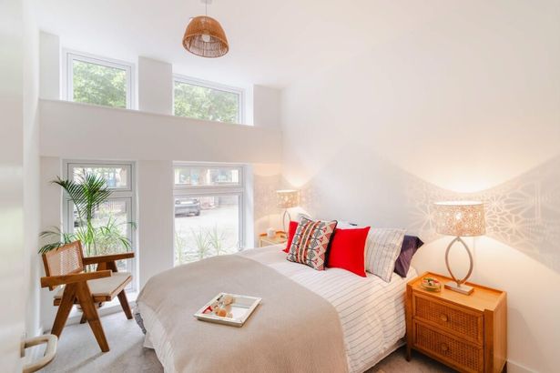 The apartments feature large bedrooms with high ceilings