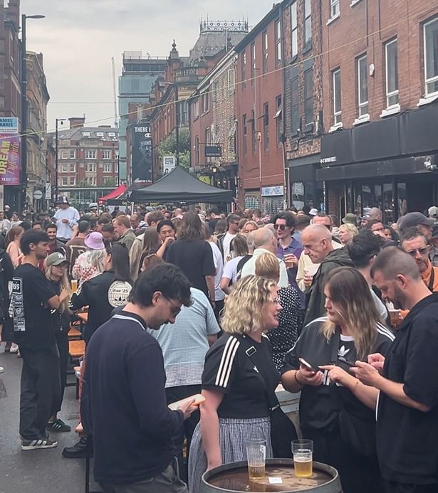 People enjoying the Northern Quarter Block Party on Thomas Street during the Oasis gigs