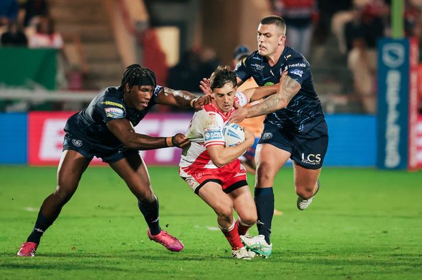 Arthur Mourgue is tackled by Junior Nsemba and Brad O'Neill.