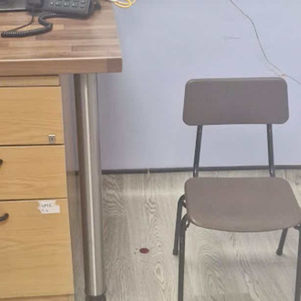 Blood drips on the floor from the ceiling above at Barry Hospital