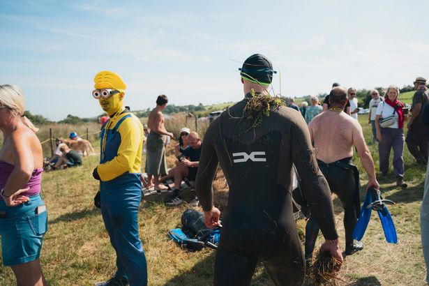 Competitors at the Bog Snorkelling World Championships, held in Llanwrtyd Wells, Powys, Wales