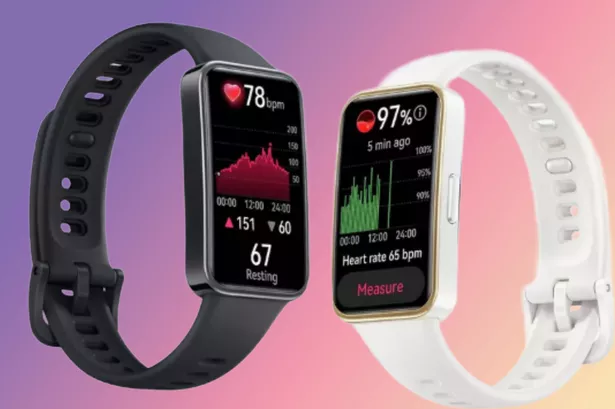 Huawei smartwatch on purple pink background