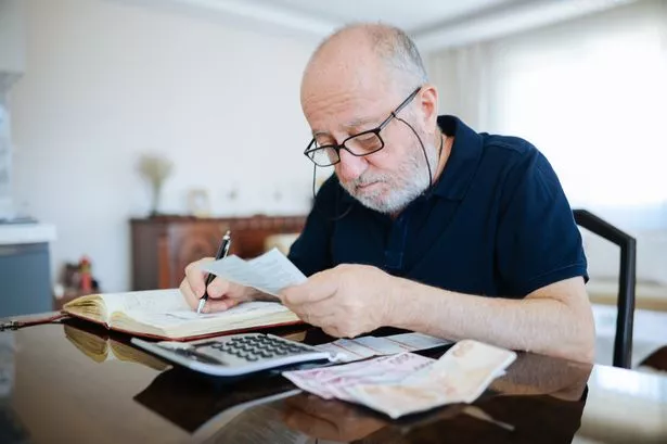 A older man checking his finances