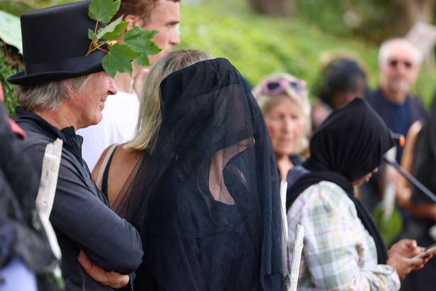 'Tree brides' hold a funeral at the Baltic Wharf Caravan Park site on August 11, 2025 - the day the caravan park closed to make way for a housing development. In 2021, 70 women 'married' individual trees in the park as part of a campaign against the redevelopment