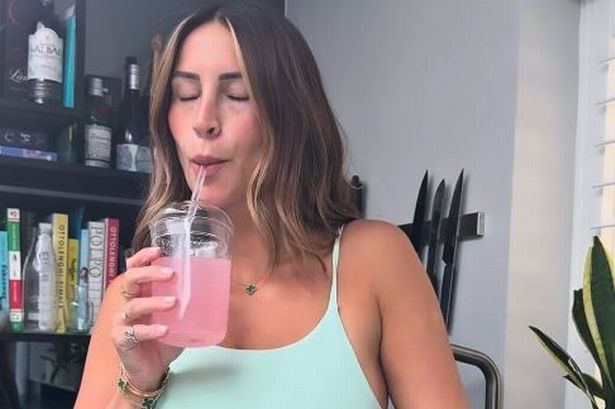 Ferne McCann drinking berrie flavoured food supplement