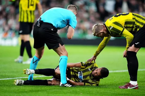 Edmilson goes down injured at Parkhead