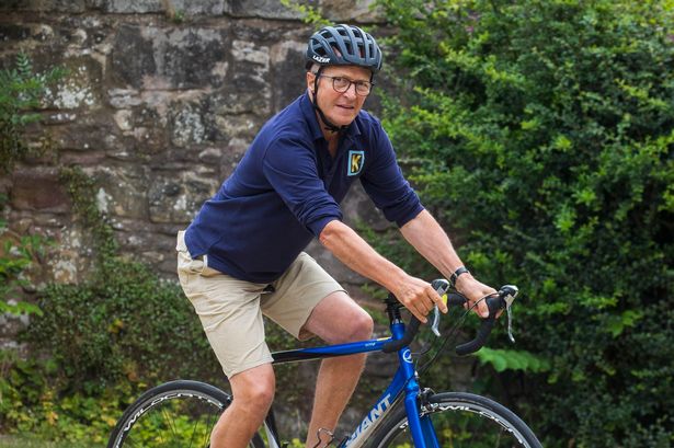 The man was diagnosed with cancer after his friend noticed he was sitting 'wonky' on his bike