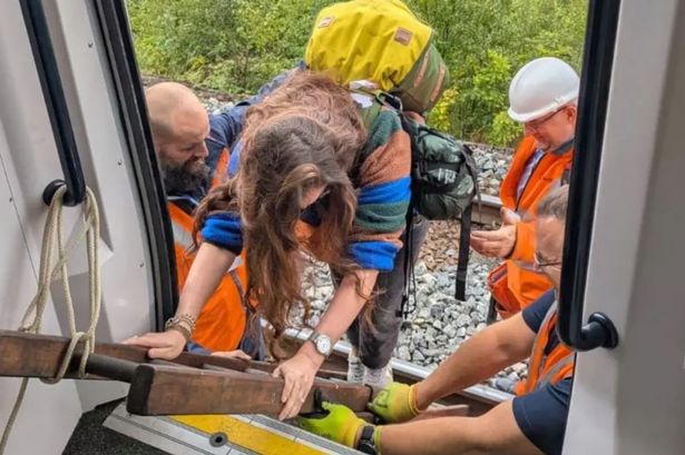 People being evacuated from a Scotrail train
