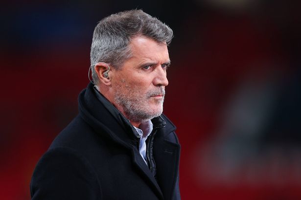 Roy Keane looks on