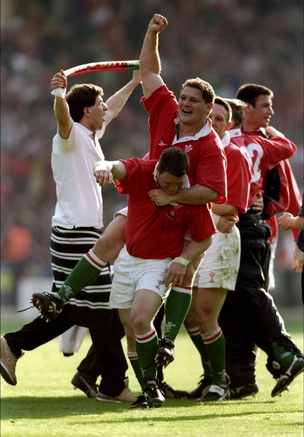 Peter Rogers and Scott Gibbs of Wales celebrate victory over England