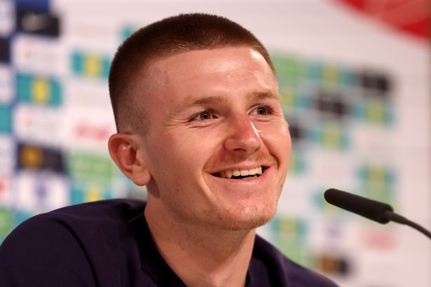 Adam Wharton of England talks to the media