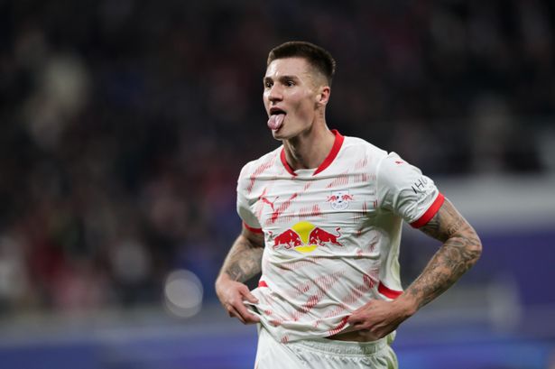 Benjamin Sesko celebrates after scoring for RB Leipzig.