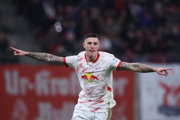 Benjamin Sesko celebrates after scoring for RB Leipzig.