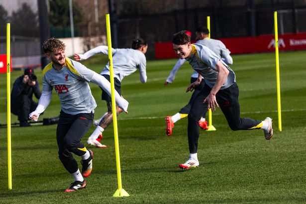 Harvey Elliott and James McConnell of Liverpool during a training session