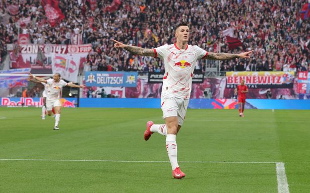 Benjamin Sesko celebrates after scoring for RB Leipzig.