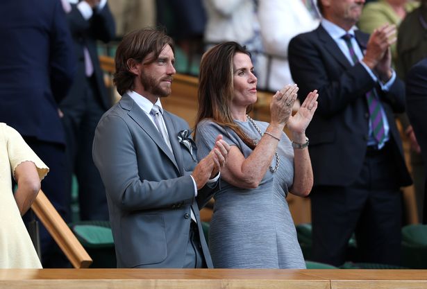 Tommy Fleetwood and Clare Fleetwood applaud in the Royal Box following Emma Raducanu of Great Britain's victory against Marketa Vondrousova 